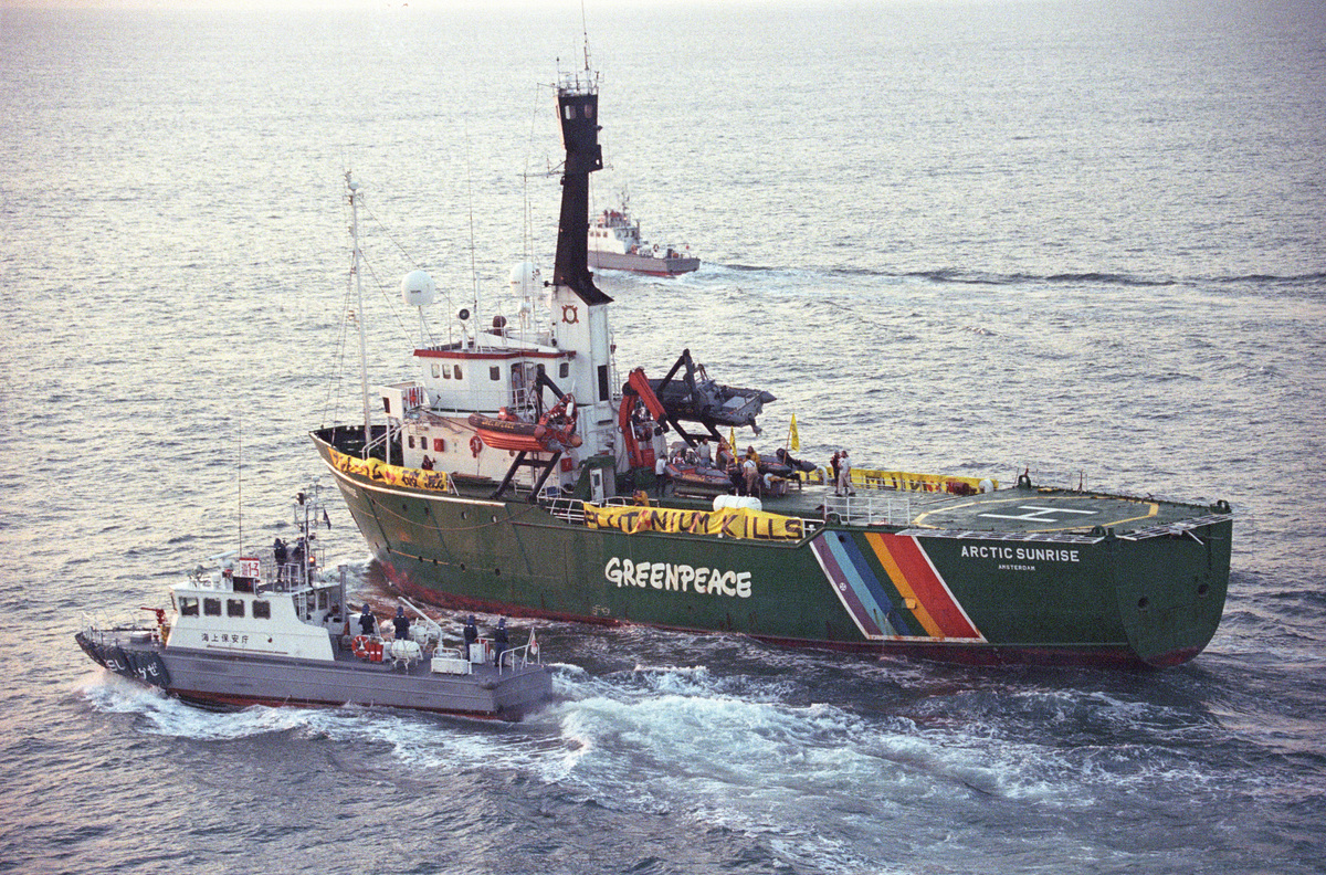 Greenpeace action in Fukushima Harbour. Japanese forces attempt to stop the action. Japan. © Greenpeace / Andrew MacColl