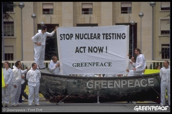 Greenpeace protest at the UN building in Geneva, to bring nations to sign the Comprehensive Test Ban Treaty