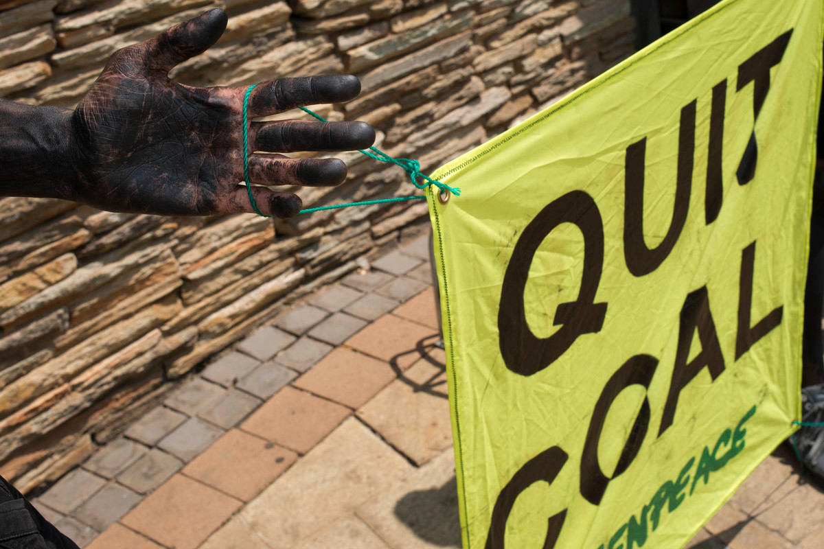 Action at Dept of Trade and Industry in South Africa. © Shayne Robinson / Greenpeace