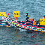 Local fishermen on colourful traditional boats display banners with various messages including “Protect the Oceans” and “Stop Fishmeal”. The activity is carried out after the fishermen have met Greenpeace and discussed how to work together to put pressure on fishery authorities to protect the ocean and stop fishmeal production plants. 
The Greenpeace ship MY Arctic Sunrise is in Dakar as part of the “Protect the Oceans” tour, a year long pole to pole expedition. 
The aim of the expedition is to raise awareness among decision-makers and the international community of the need to protect the oceans and to safeguard biodiversity and ensure the sustainable use of the resources on which many of the world's poorest and most vulnerable people depend.