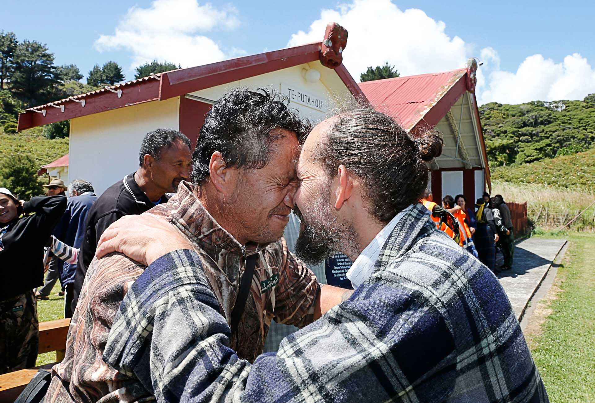 Former Greenpeace campaigner Steve Abel and Elvis Teddy greet each other at the Oil Drill Withdrawal Festival in New Zealand: The Greenpeace crew of the new Rainbow Warrior met Te Whānau a Apanui at Whangaparaoa, East Cape to celebrate the withdrawal of oil giant Petrobras which had planned to drill for deep sea oil.