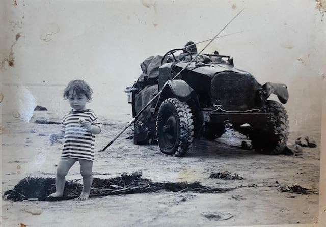 Me as a two year old - we never see big clumps seaweed on the beach like this anymore.