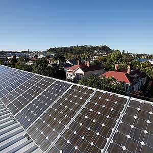 Twenty four photovoltaic panels on the roof of the Greenpeace New Zealand building, help generate electricity for the office. Any surplus can be feed back into the grid. The panels were installed in 2009 as part of an ongoing program of environmental management and improvement within the organization. 
One of Auckland's volcanic cones, Mt Eden, can be seen in the background.