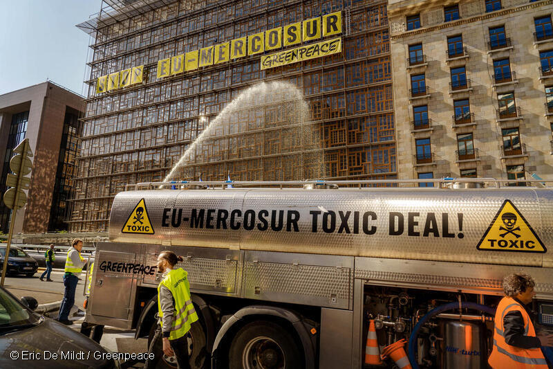 Activists from Greenpeace Belgium climb the EU Council headquarters in Brussels, and spray the building with an agricultural pesticide pump, while EU trade ministers discuss the EU-Mercosur trade deal.