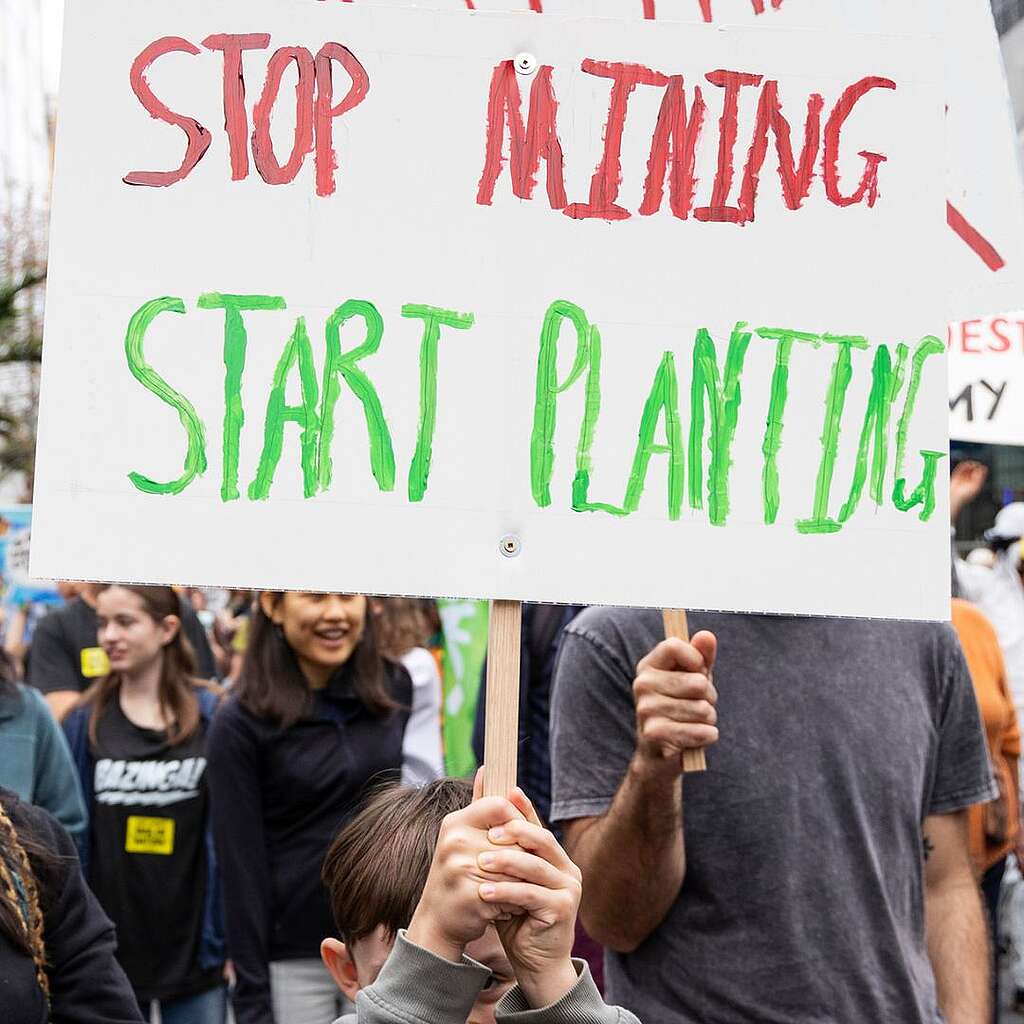 Placards from the March for Nature -Stop mining, Start planting