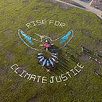 Hummingbird Rising: Human Mandala for Climate Justice in San Francisco. © Josh Edelson
