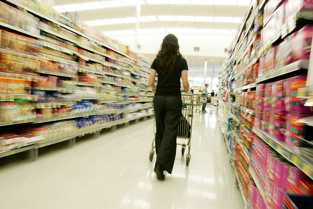 Shopper in supermarket. © Nigel Marple