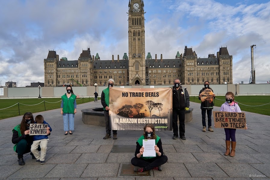 Greenpeace protesters in front of Parliament in Ottawa