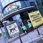 Greenpeace activists protest at ArcelorMittal headquarters in Luxembourg.