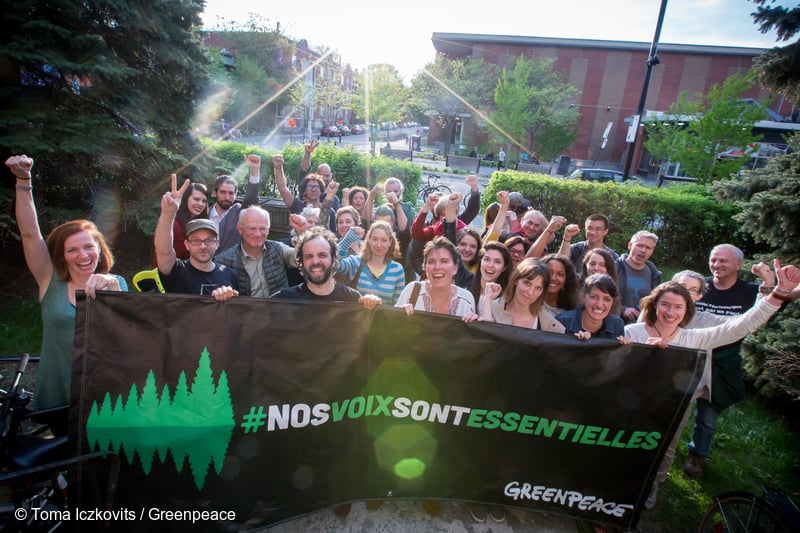 Outside the Montreal office, Greenpeace Canada stands in solidarity with the message #OurVoicesAreVital to unite against Canadian logging company Resolute's multiple lawsuits to stifle free speech and the organisation's work to protect the Great Northern Forest in Canada.