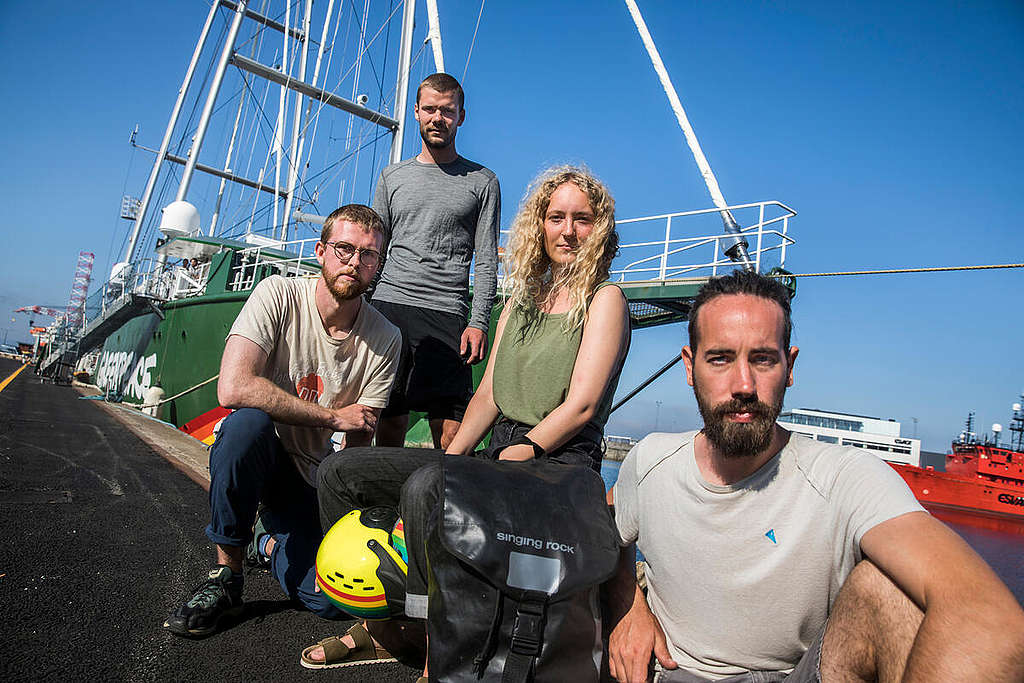 From left: Esben, Jakob, Ida Marie and Fabian with Rainbow Warrior in the background.