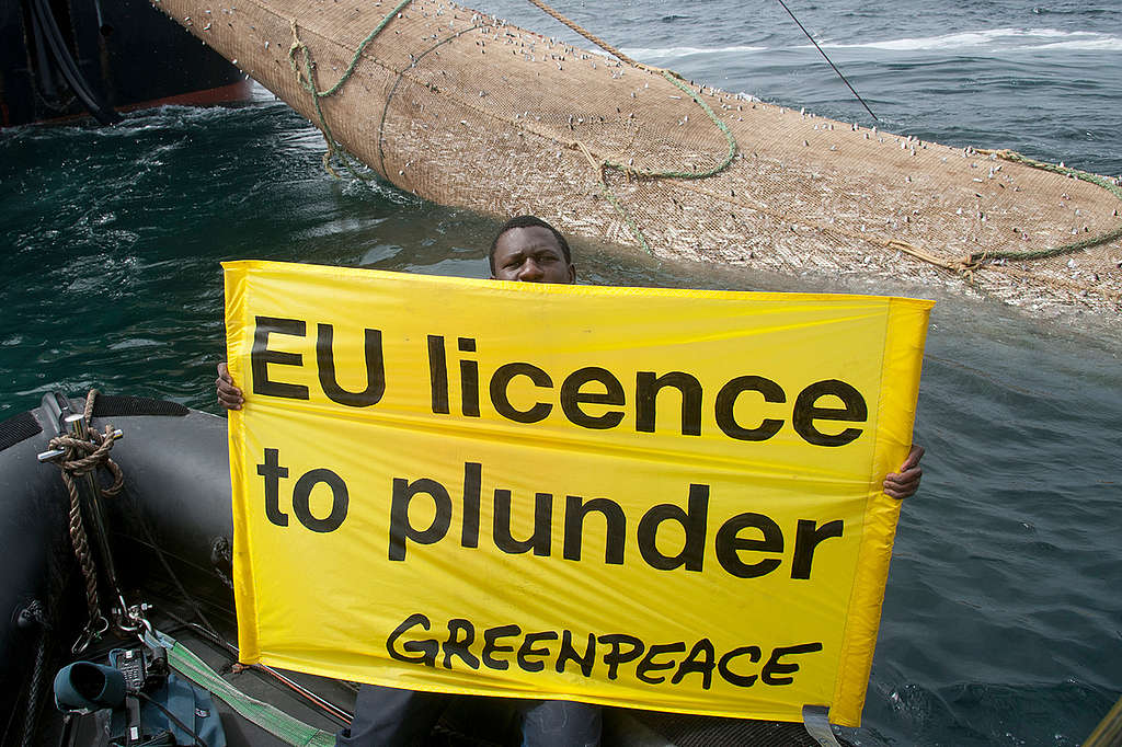 Protest against Overfishing in Africa. © Greenpeace / Pierre Gleizes