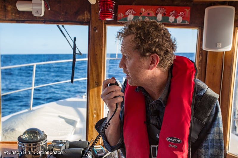 Greenpeace NZ Executive Director Russel Norman delivers radio message to seismic testing vessel the Amazon Warrior.