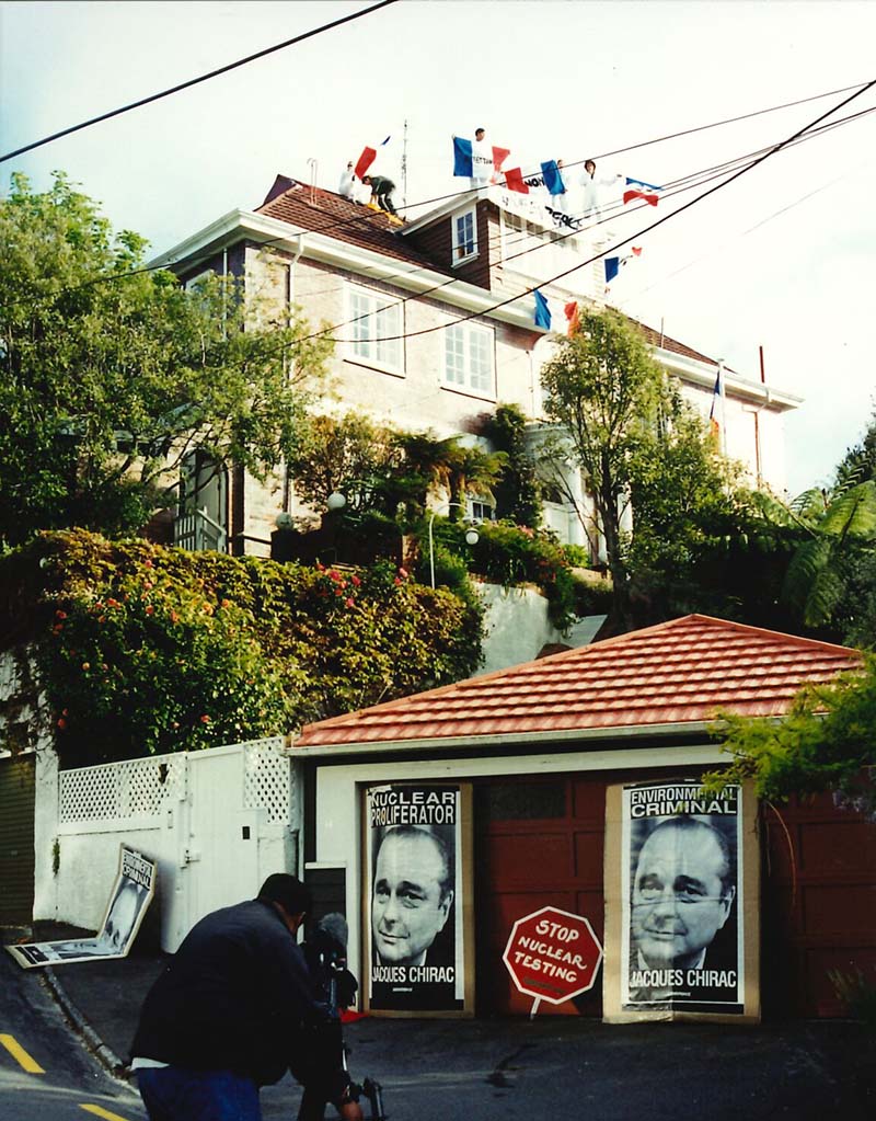 2 October 1995: Greenpeace activists protest against the second French nuclear test of the year by occupying the roof of the French Ambassador’s residence in Wellington and delaying his departure for a meeting at the Beehive. Photo: Rob Taylor