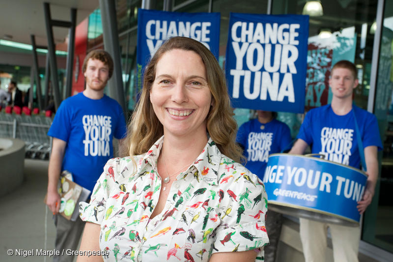 Greenpeace New Zealand Oceans Campaigner Karli Thomas at a'Change your Tuna' event outside an Auckland supermarket on World Oceans Day 2012. Volunteers informed customers about two brands of sustainably caught tuna - Pams and Fish 4 Ever - being sold in New Zealand and offered customers the chance to swap their just-purchased cans of tuna for the sustainable alternatives