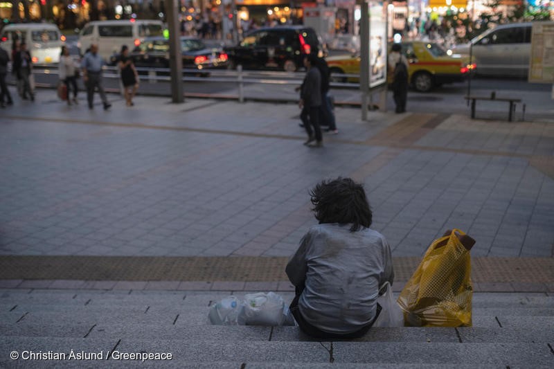 Homeless man in Tokyo, October 2018. United Nations human rights Special Rapporteurs in 2018 called for urgent action by the Japanese government over reports of widespread exploitation of workers conducting decontamination work in Fukushima prefecture, including reports of recruitment of homeless people, asylum seekers, and foreign technical trainees. More than 70,000 decontamination workers have been employed in areas of Fukushima during recent years, some earning as little as 20 dollars a day. The Governments decontamination program, involving hundreds of sub contractors, has been estimated to cost from 4-5 trillion yen to as much as 30 trillion yen (271 billion dollars). Yet 70% of Fukushima is mountainous forest that cannot be decontaminated. Christian Aslund/Greenpeace