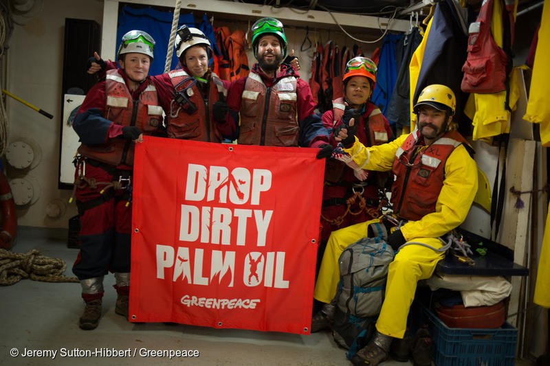 Atlantic Ocean, on 17 November 2018. - Activists prepare to leave the MV Esperanza to begin their boarding action on a giant tanker ship carrying dirty palm oil from Indonesia to Europe in a peaceful protest against rainforest destruction.Trained Greenpeace climbers from Indonesia, Germany, the UK, France, Canada and the US, have safely scaled the side of Stolt Tenacity and aim to stay on board until it arrives at its final destination in Rotterdam.The 185-metre long cargo ship is loaded with palm oil from Wilmar, the largest and dirtiest palm oil trader in the world.