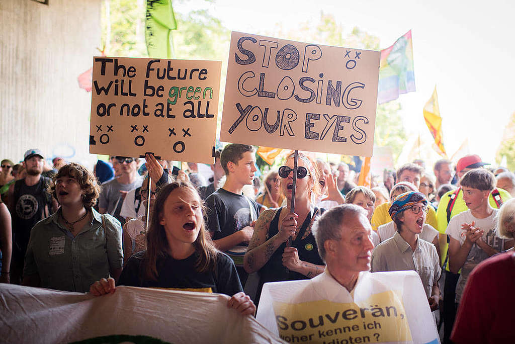 「趨吉避凶」實屬人之常情，但氣候危機最終仍須我們睜開眼共同面對。 © Chris Grodotzki / Greenpeace