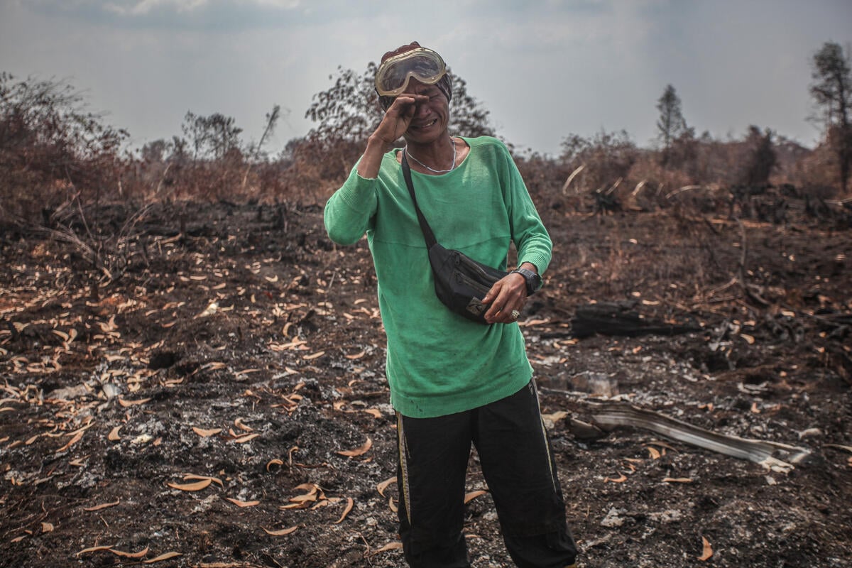 Villager in Forest Fires Area in South Sumatra. © Abriansyah Liberto / Greenpeace