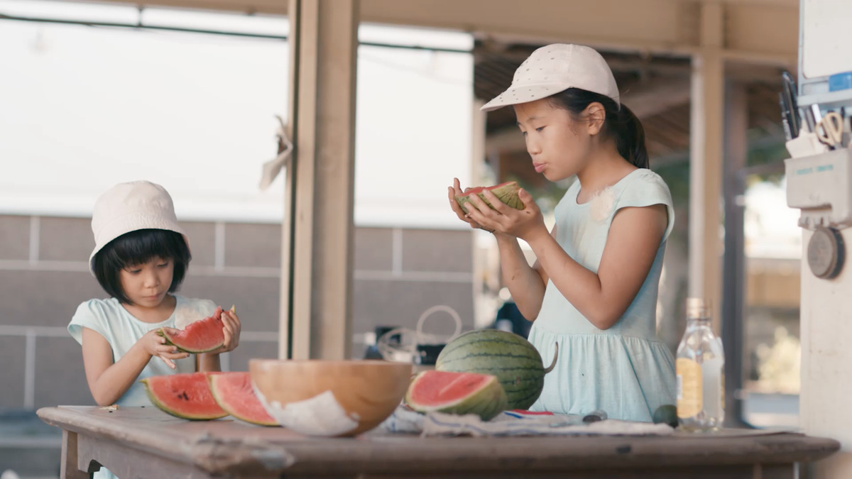 Girls Eating Watermelon at Ecological Farm in Tokyo © Greenpeace