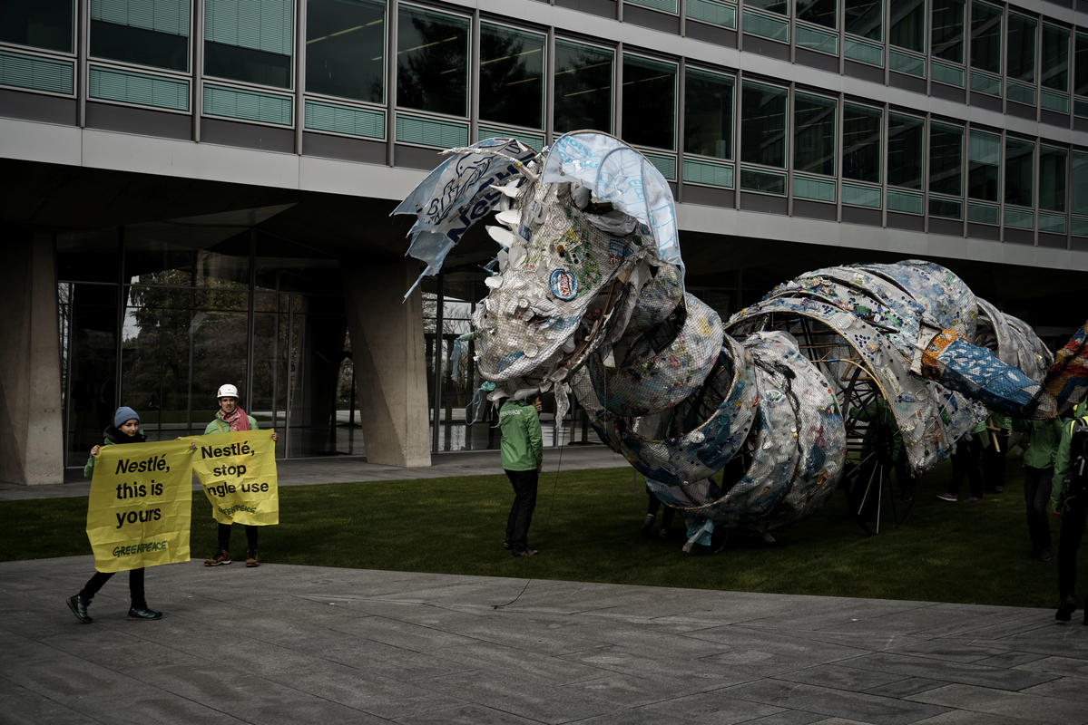Greenpeace activists ship “plastic monster” back to Nestlé's Headquarters -  Greenpeace International