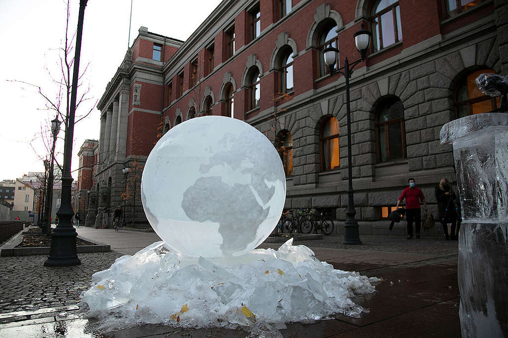 People against oil ice sculpture at Supreme Court hearing in Oslo