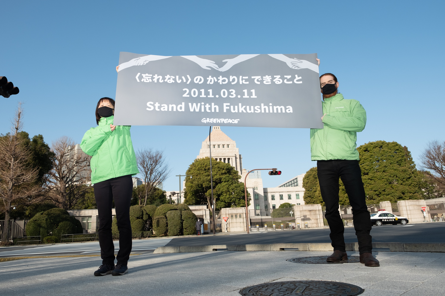 Greenpeace Japan banner action for Fukushima 10th anniversary.©︎Taishi Takahashi / Greenpeace
