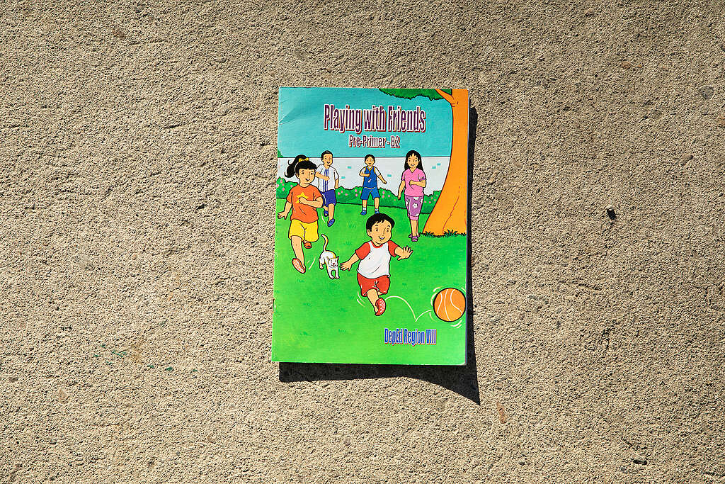 A kindergarten workbook from the Philippines, titled "Playing with Friends"