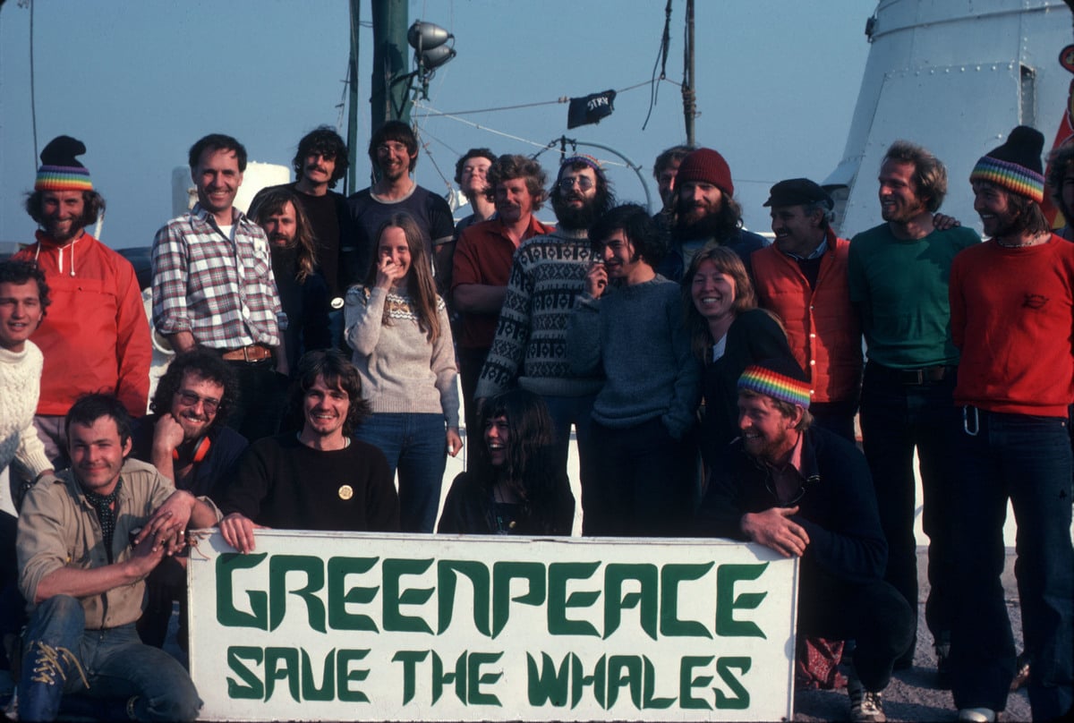 Rainbow Warrior Crew with Whaling Banner in Shetland. © Greenpeace / Jean Paul Ferrero