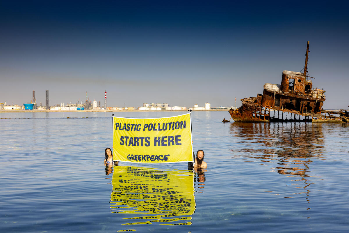 Banner Action near ENI Petrochemical Plant, Brindisi. © Greenpeace / Lorenzo Moscia