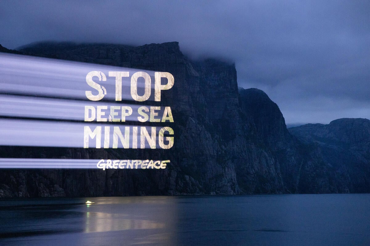 Projection against Deep Sea Mining in Norway. © Daniel Müller / Greenpeace