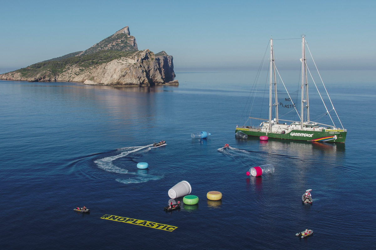 The Rainbow Warrior Invaded by Giant Plastic Packaging in the Med. © Pedro Armestre