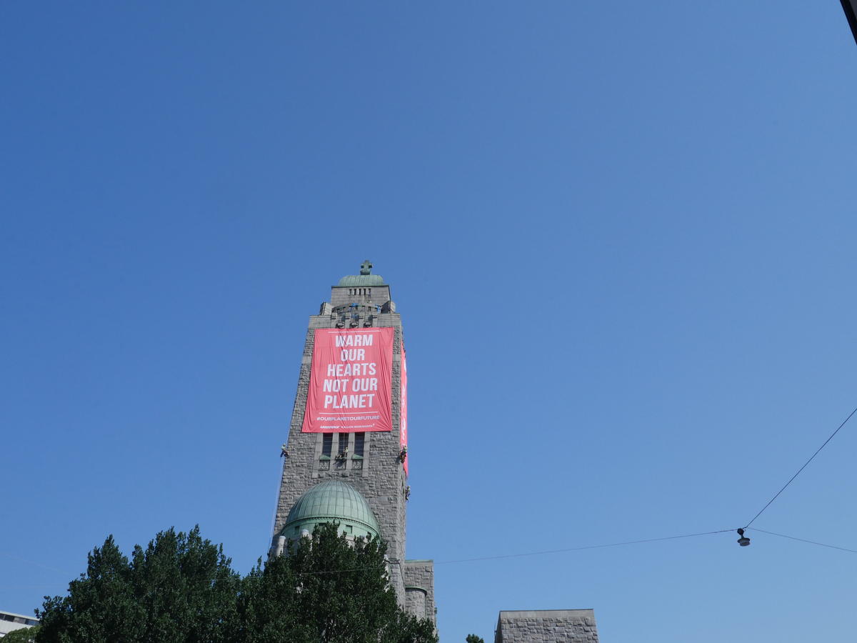 Trump - Putin Summit Banners from Bell Tower in Helsinki.