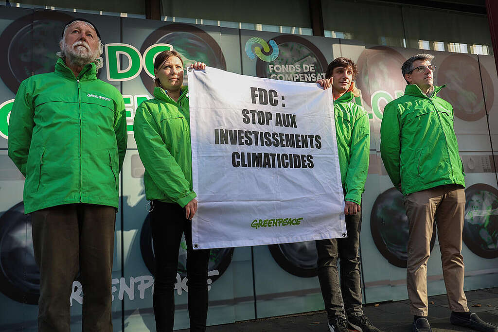 Protest at National Pension Fund Headquarters in Luxembourg. © Anais Hector / Greenpeace
