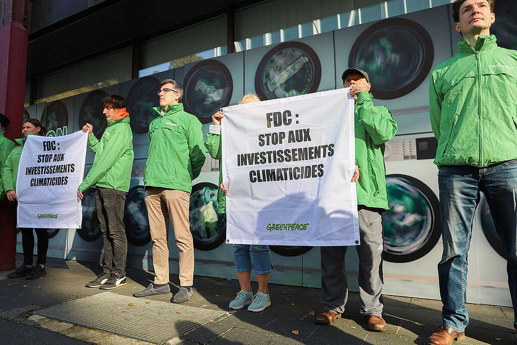 Protest at National Pension Fund Headquarters in Luxembourg. © Anais Hector / Greenpeace