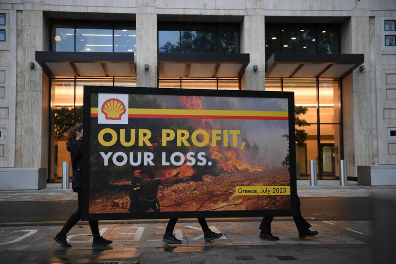 Protesters Erect Giant Spoof Billboard at Shell’s HQ in London