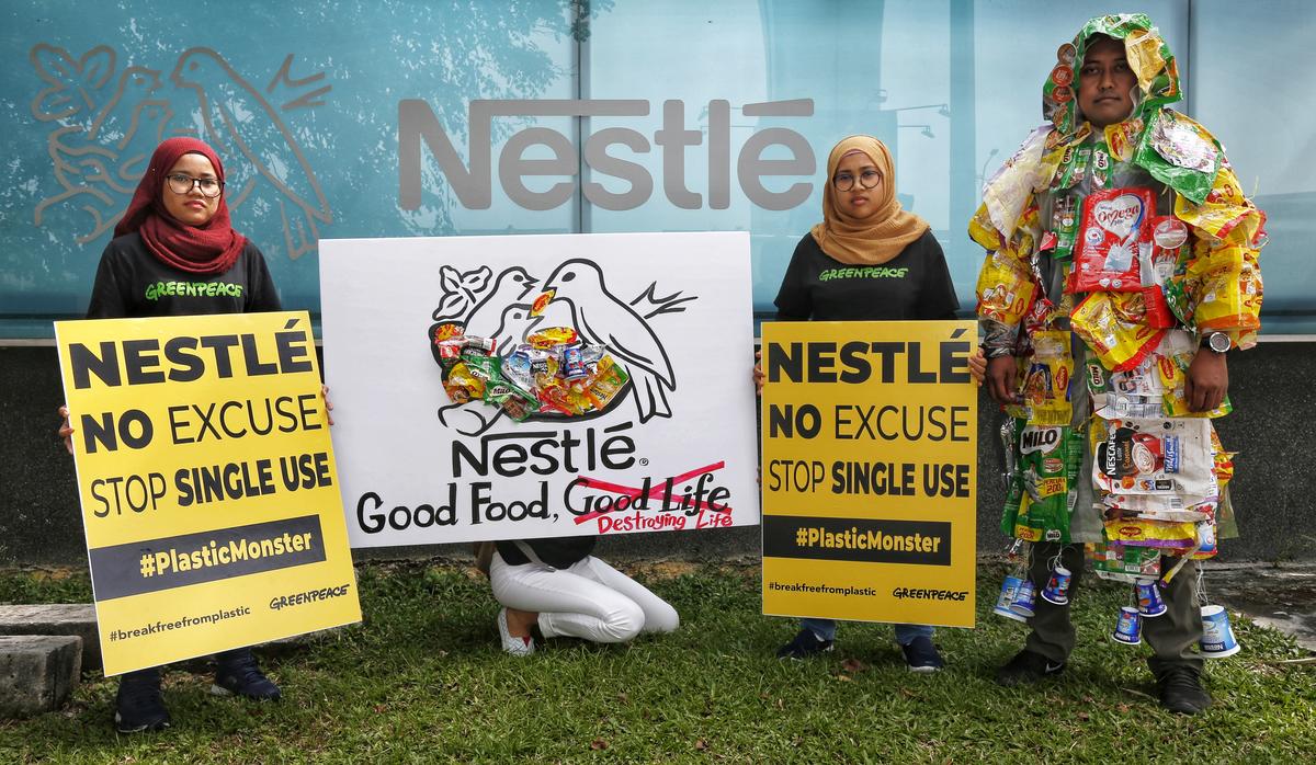 Plastic Monster Action at Nestle Headquarter in Malaysia. © Nandakumar S. Haridas / Greenpeace