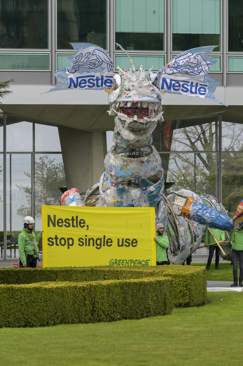 Plastic Monster Action at Nestlé Headquarters in Switzerland. © Greenpeace / Flurin Bertschinger