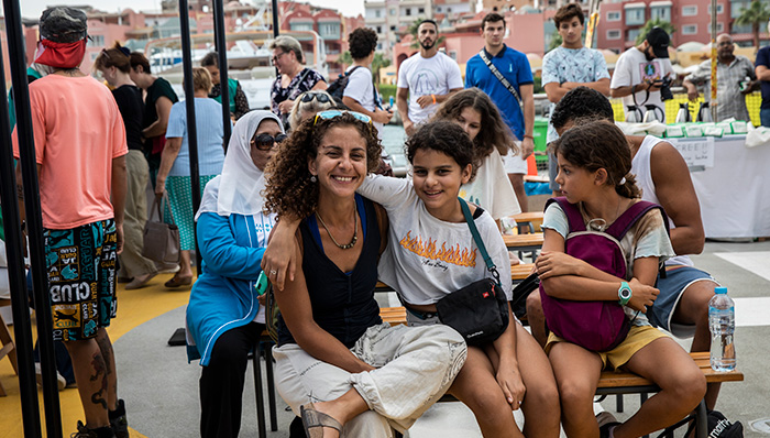 family visiting greenpeace ship