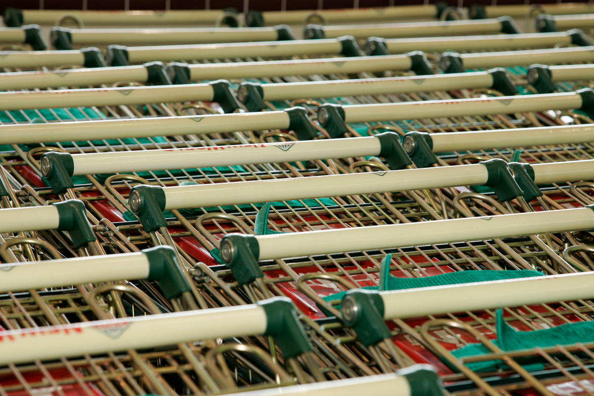 Shopping trolley in supermarket. © Nigel Marple