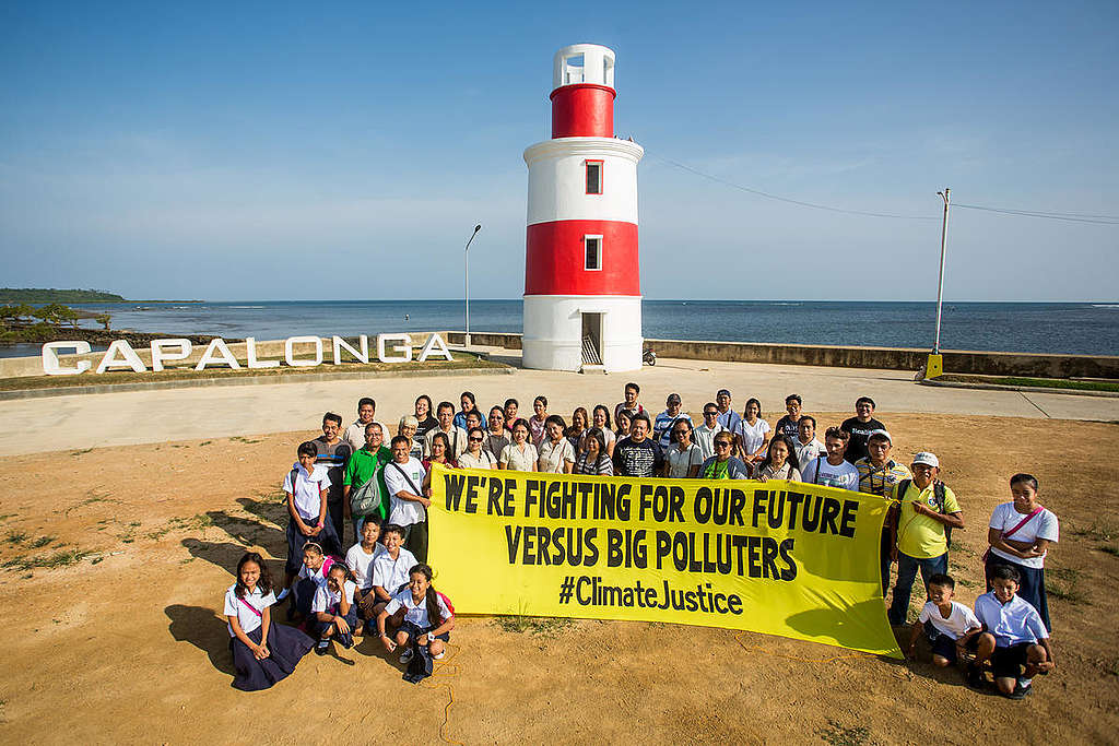 Climate Justice Photo Activity in Capalonga. © Greenpeace / Geric Cruz