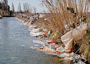 Plastic Waste Blown Away from Waste Landfill La Crau in France. © Wolf Wichmann / Greenpeace