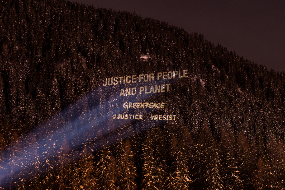 Greenpeace Justice Activity at the World Economic Forum in Davos. © Greenpeace / Lumina Obscura