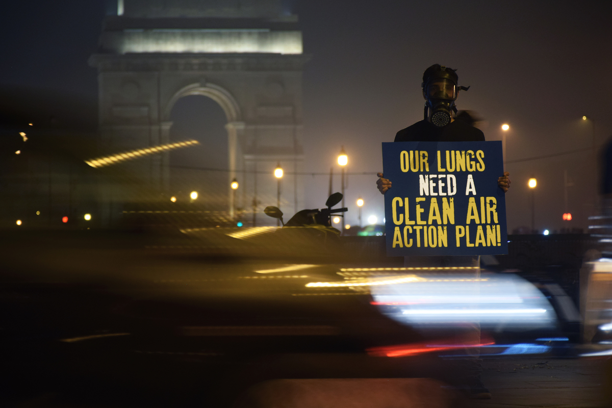 Protest Sign at India Gate in New Delhi. © Saagnik Paul / Greenpeace
