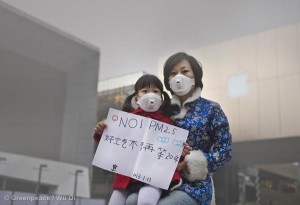 A girl and her mother wear respirator masks in Beijing.