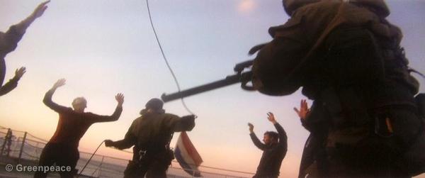  Russian security services abseiling from a helicopter onto the deck of the Arctic Sunrise and seizing the ship 