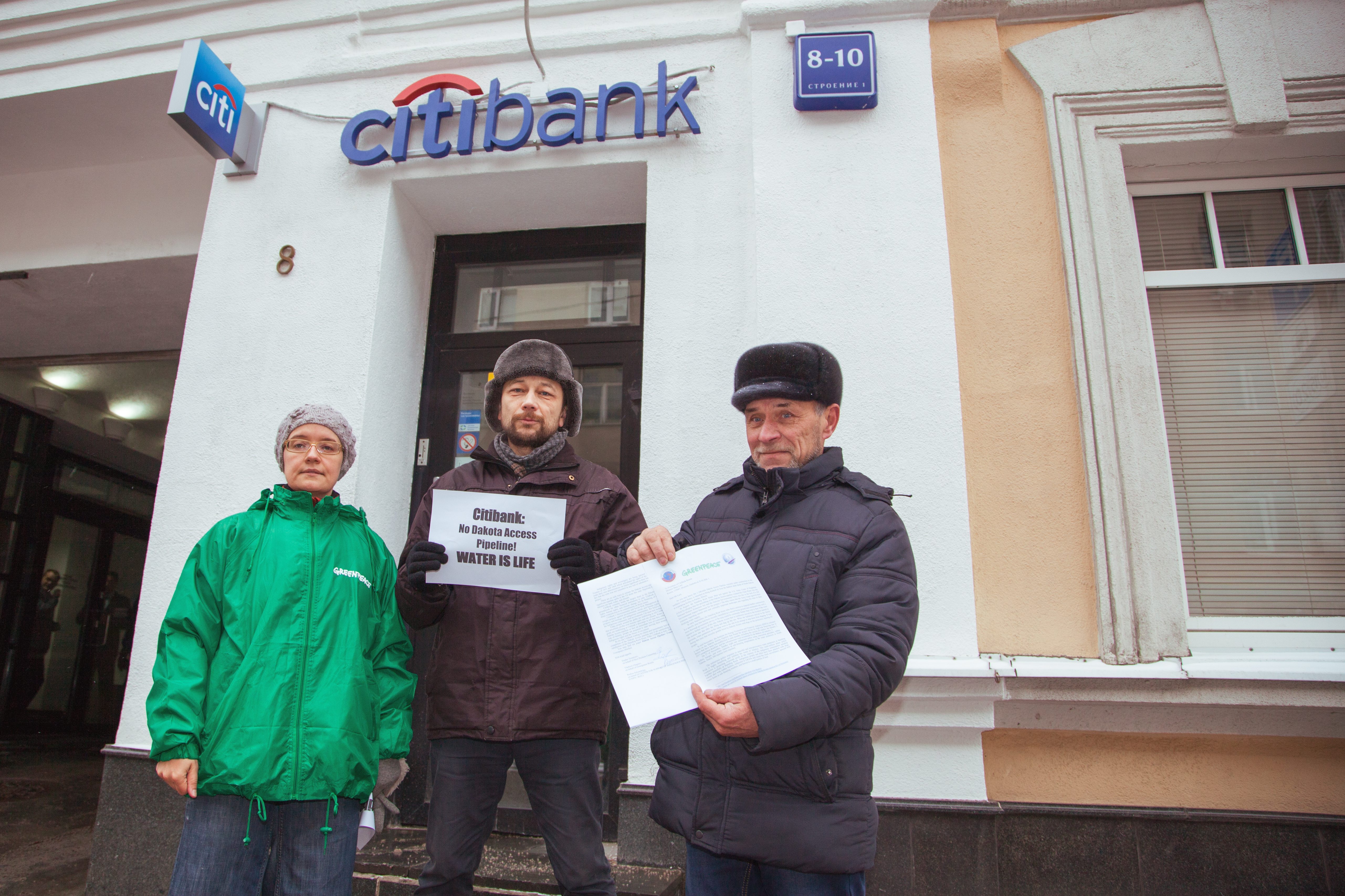 Activists in Spain who were on their third day blockading construction of a natural gas pipeline and storage facility took a moment call out Citi in solidarity with Standing Rock. Photo credit: Greenpeace.