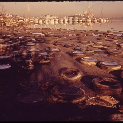 Trash and Old Tires Litter the Shore at the Middle Branch of Baltimore Harbor, January 1973