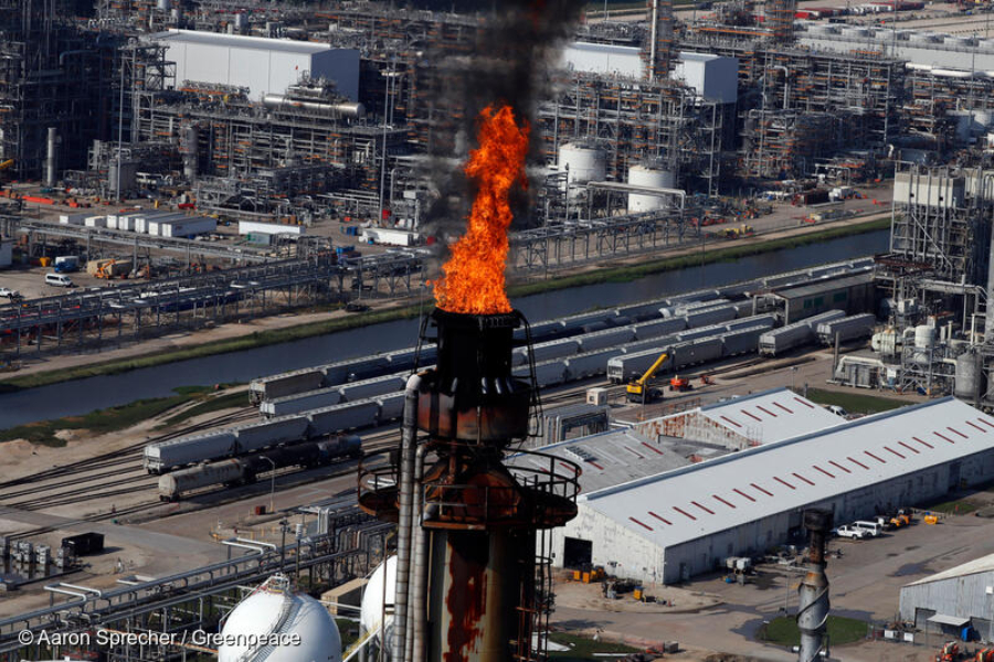 An industrial flare burns off waste at refining plant more than a week after Hurricane Harvey hit the Texas area