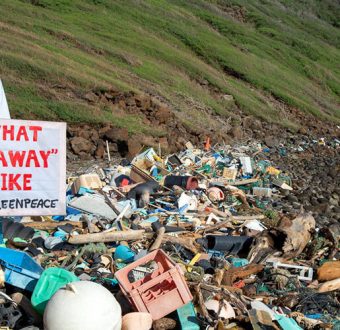 Greenpeace Ocean Director John Hocevar near plastic trash piles.